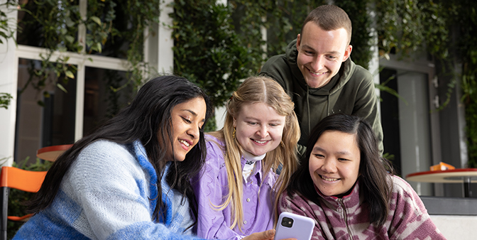 Students smiling at camera